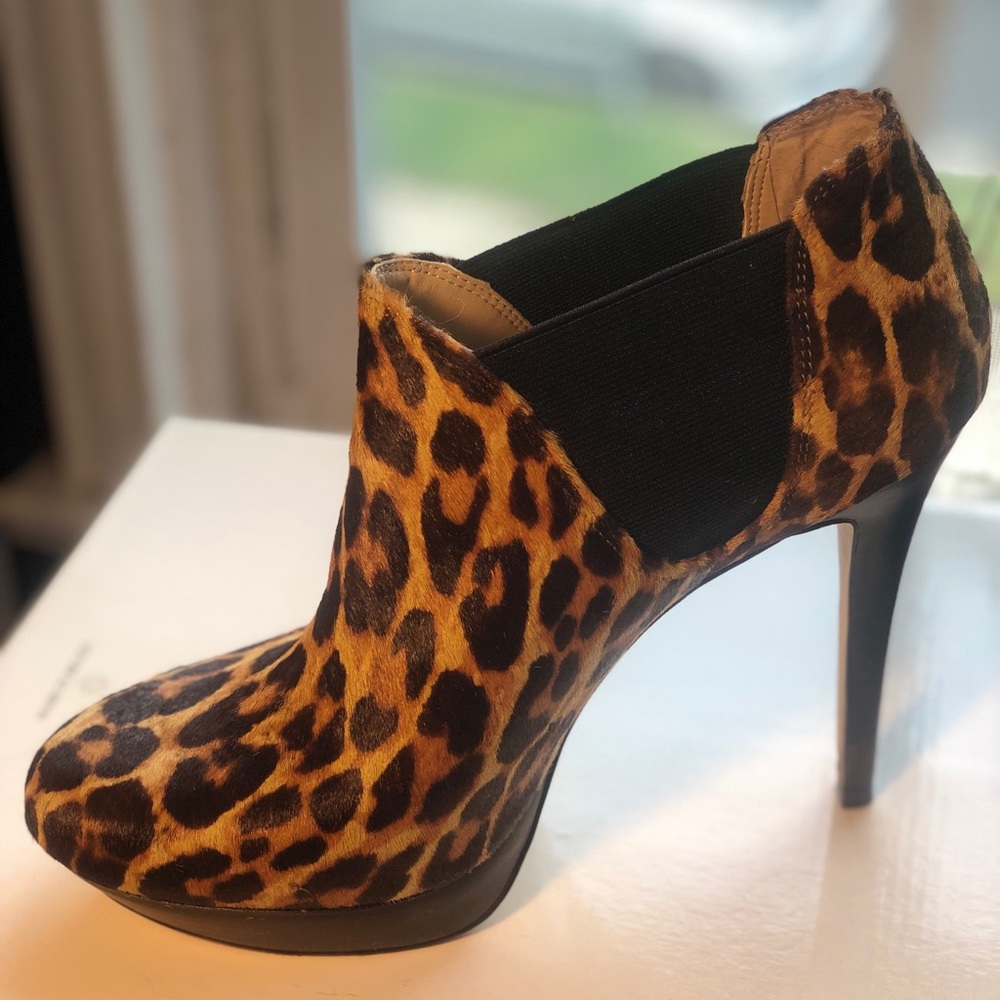 INC skyHI leopard platform booties.